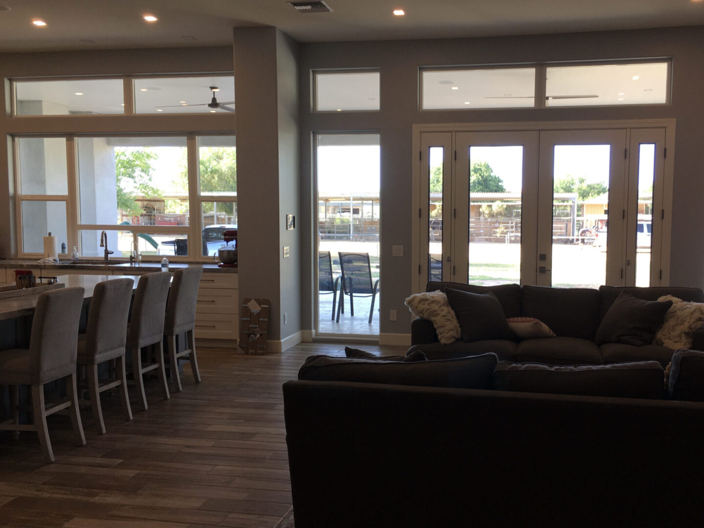 Large glass doors overlooking the outside of a house